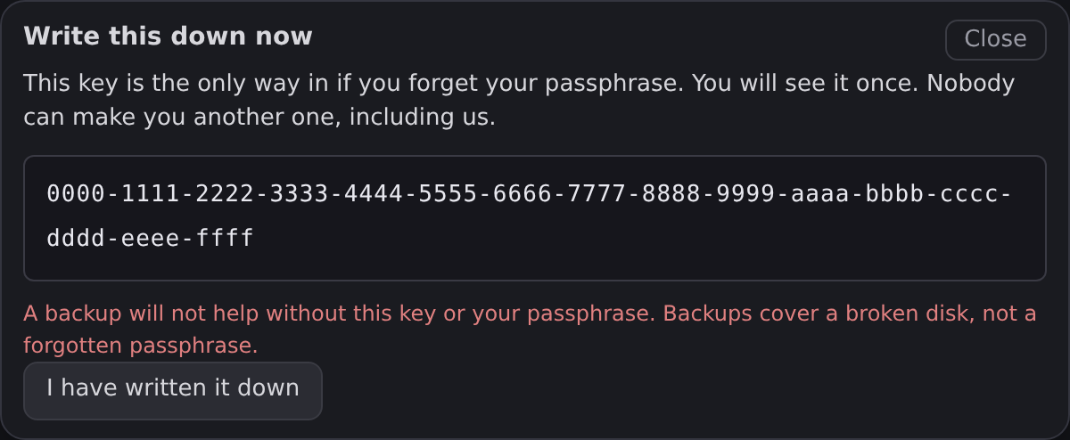 The PATANYX recovery key screen, headed Write this down now, showing a long key in groups of four characters and a button reading I have written it down.
